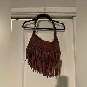 Or yany red purse with fringe